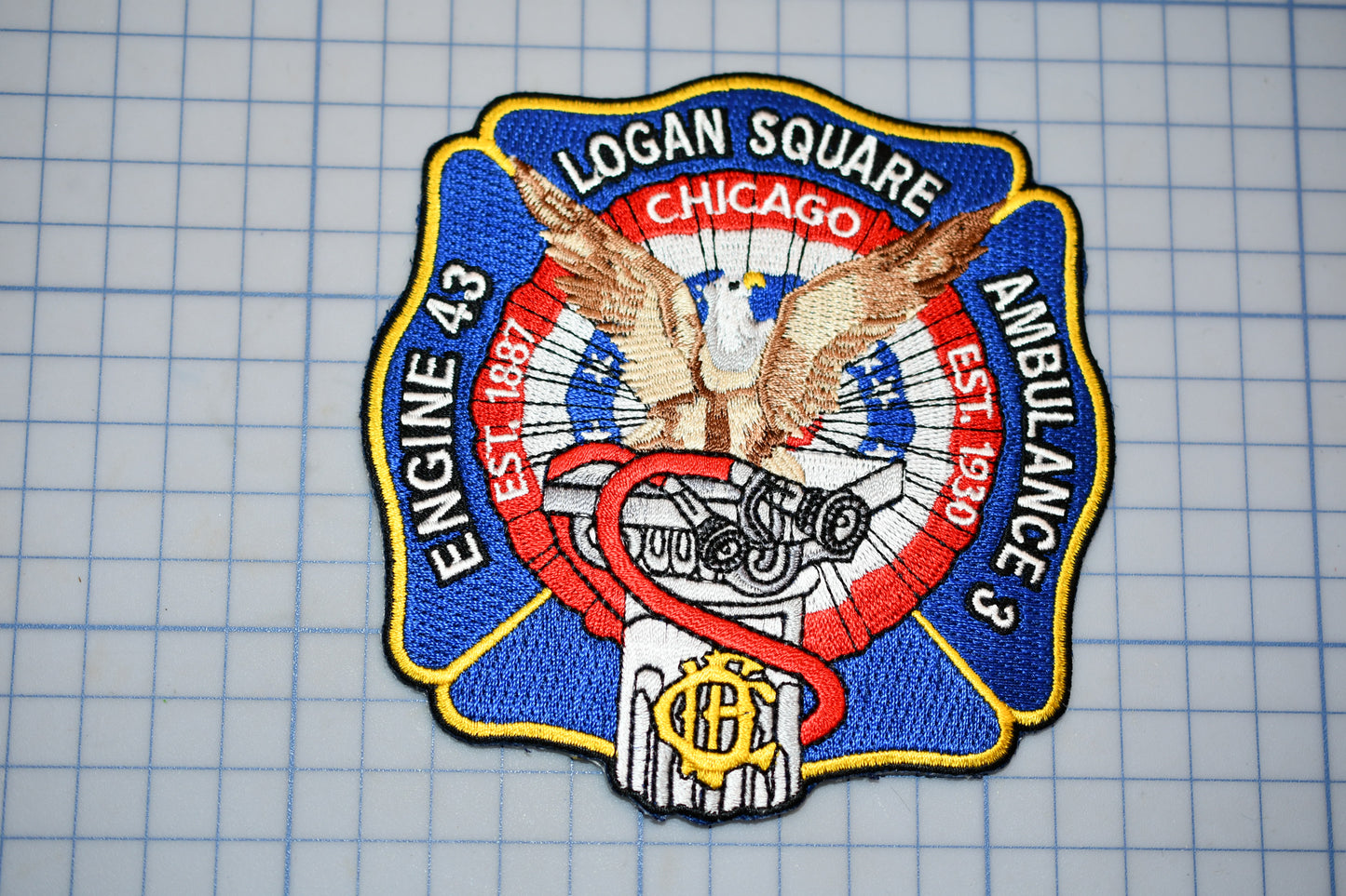 a chicago fire department patch on a cutting board