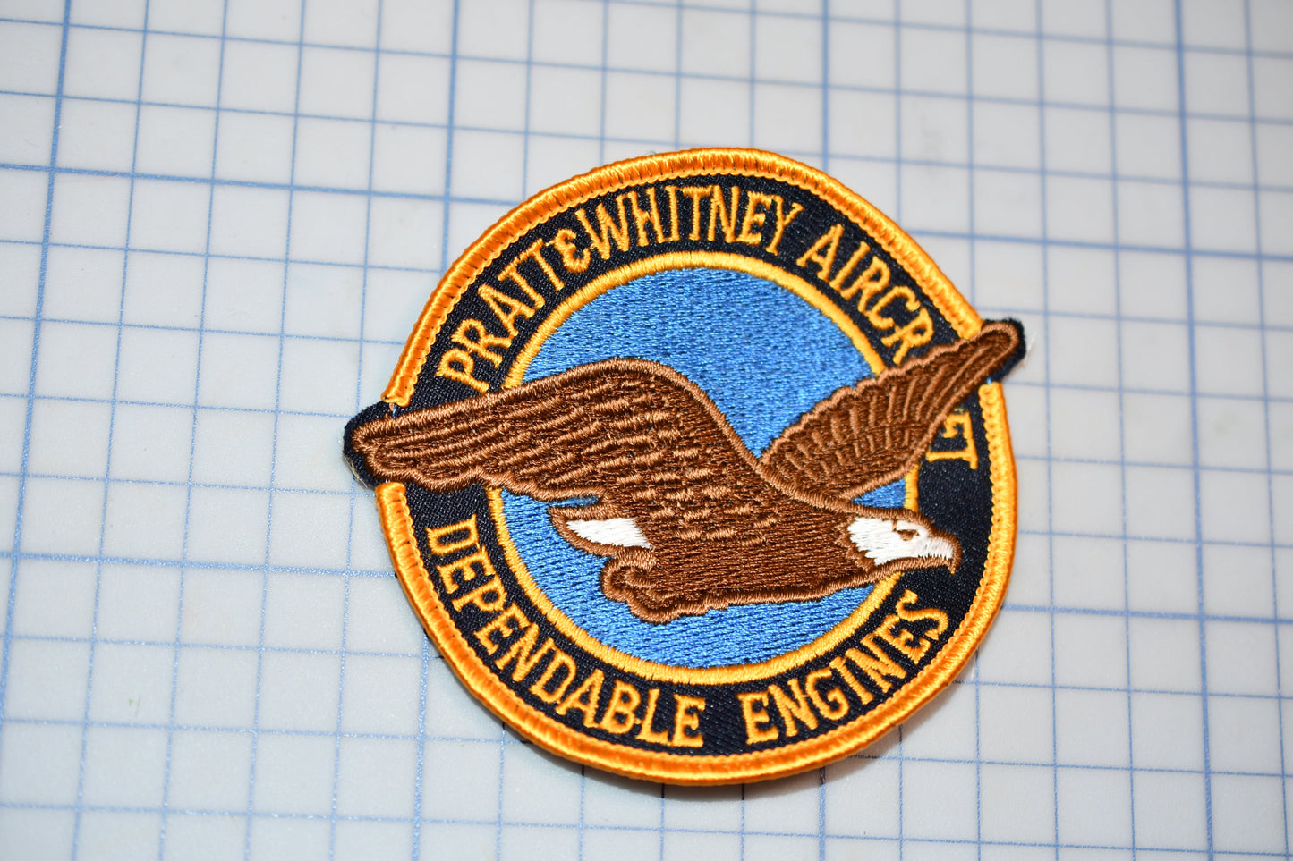 a patch with a picture of an eagle on it