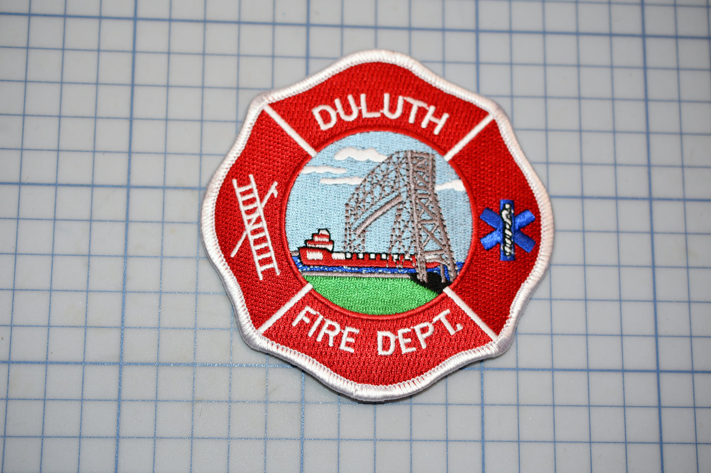 a patch with a picture of a fire department