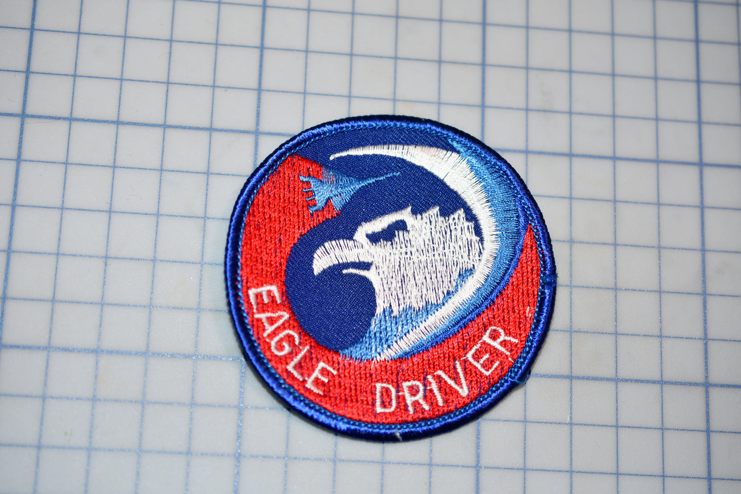 an eagle driver patch on a cutting board