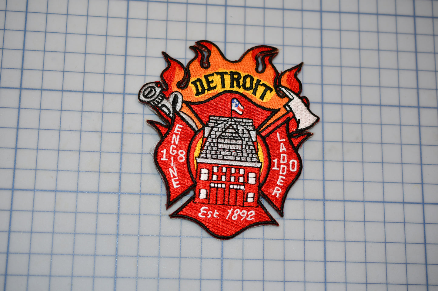 a patch with a fire department emblem on it