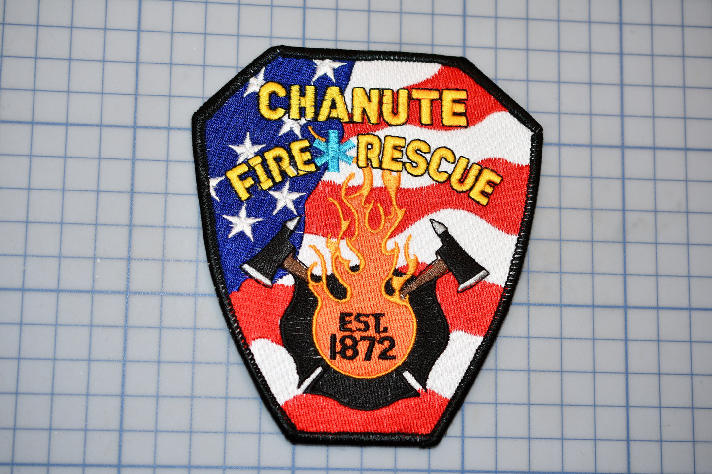 a patch with a fire rescue emblem on it