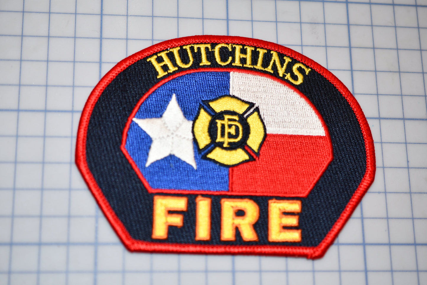 a patch with the words hutchins fire on it