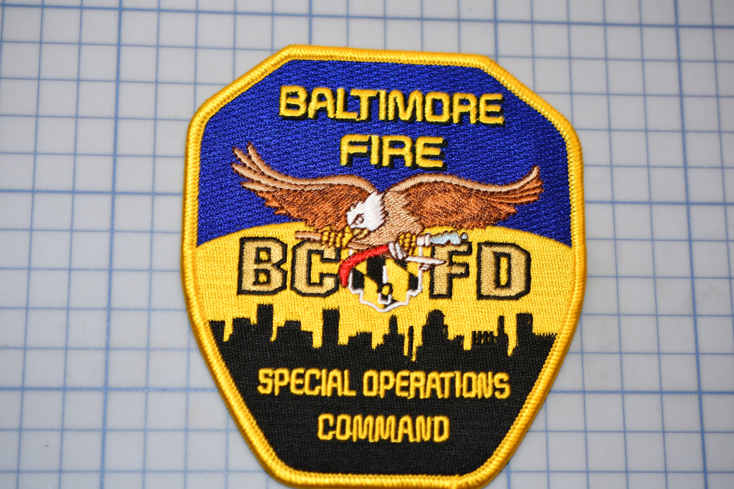 a patch with the words baltimore fire department on it