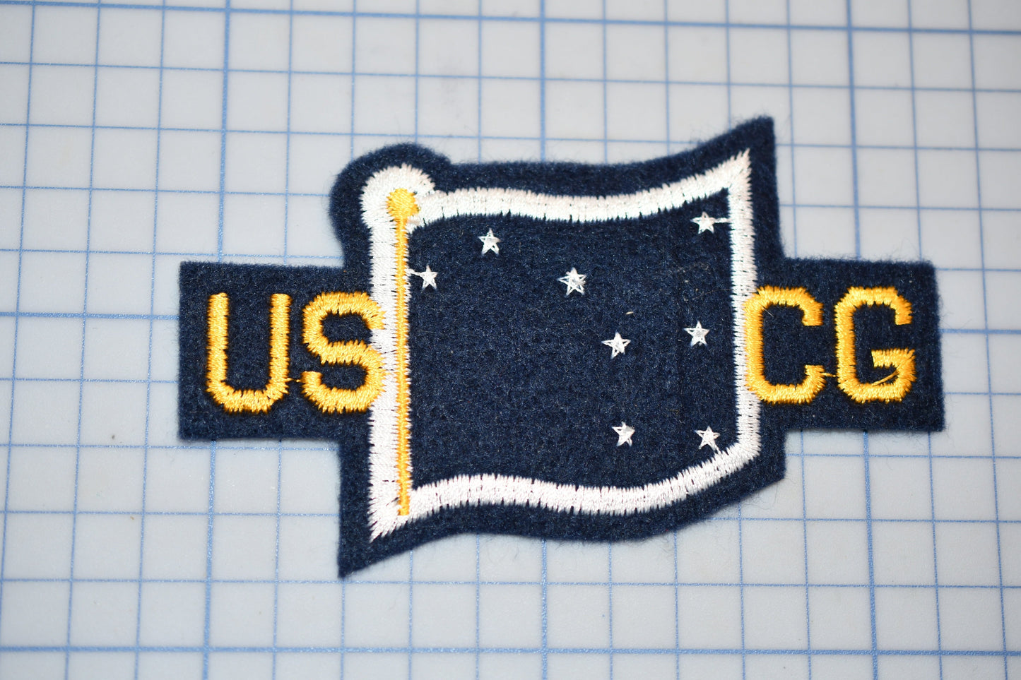 a close up of a patch on a table