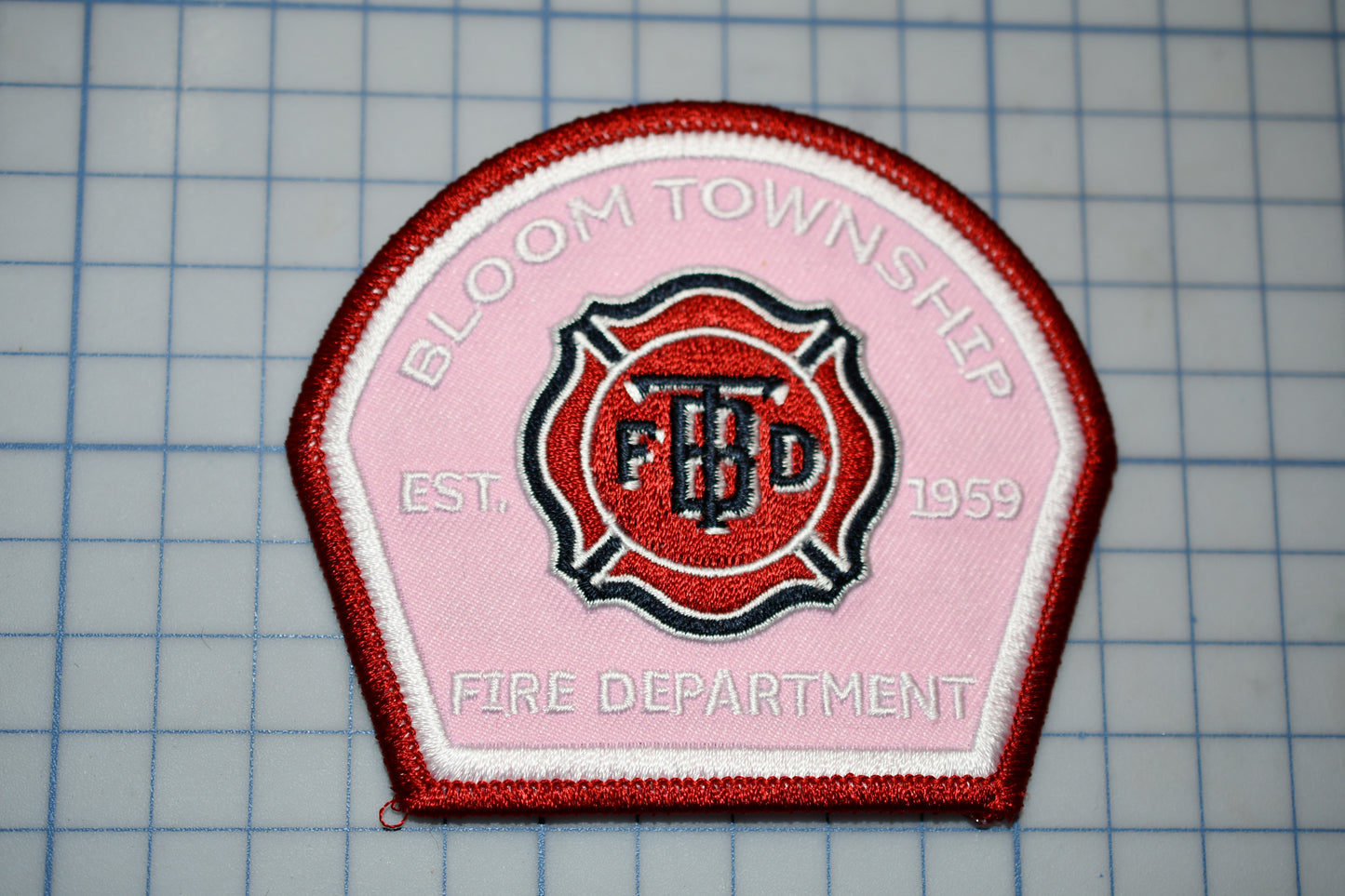 a patch with a fire department emblem on it