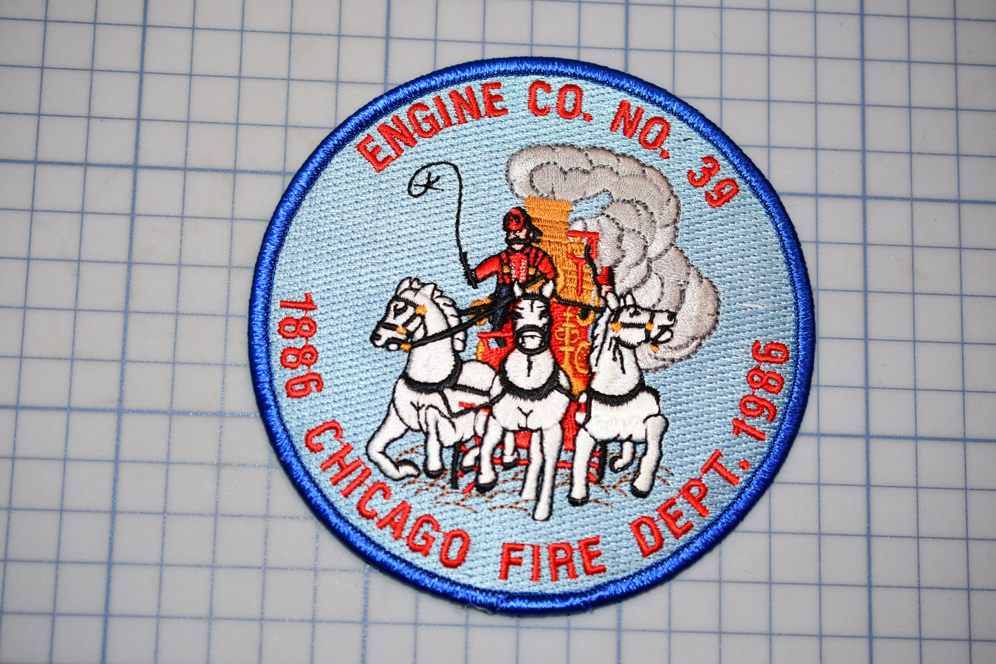 a chicago fire department patch on a piece of paper