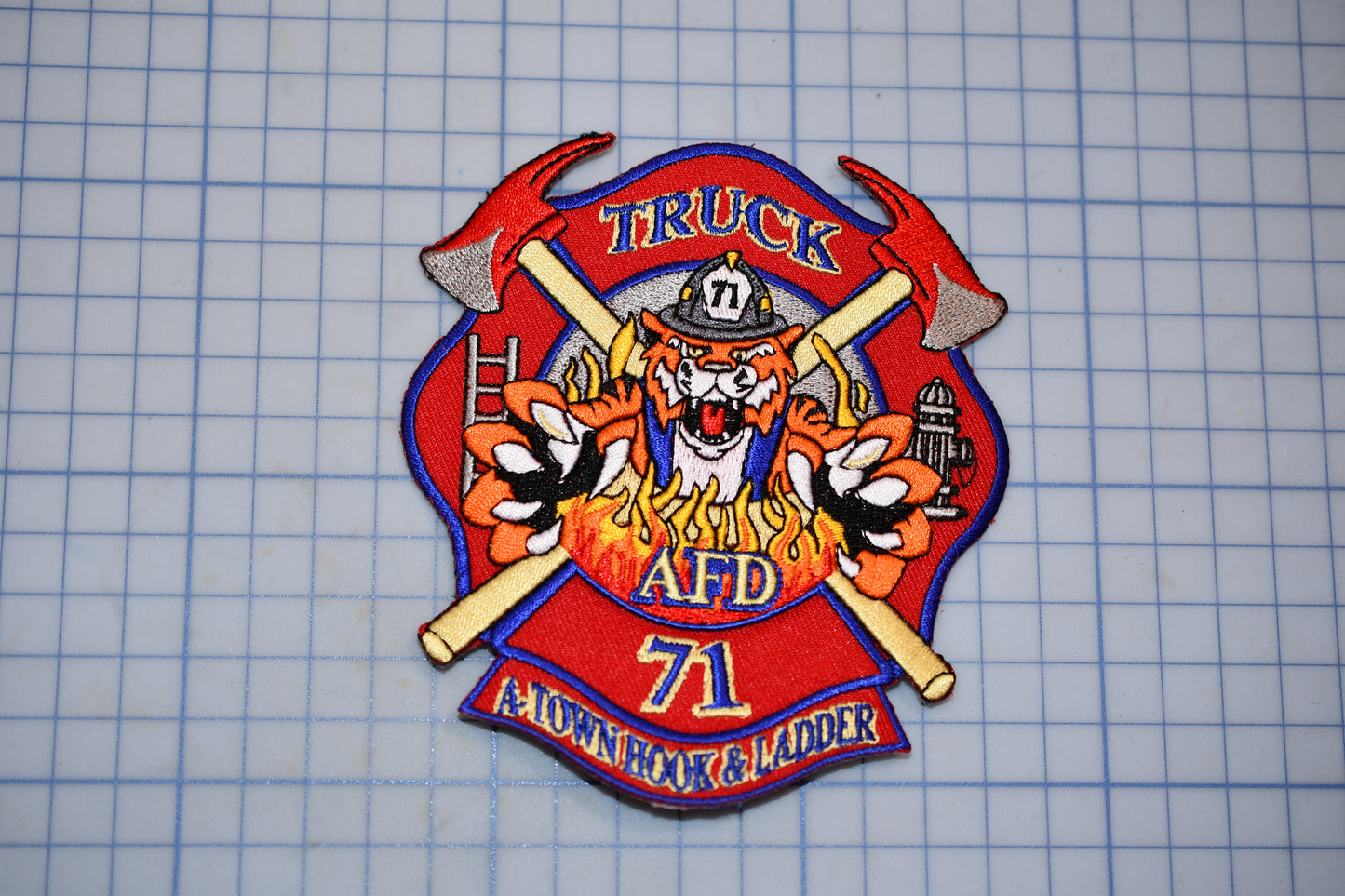 a patch with a fire department emblem on it
