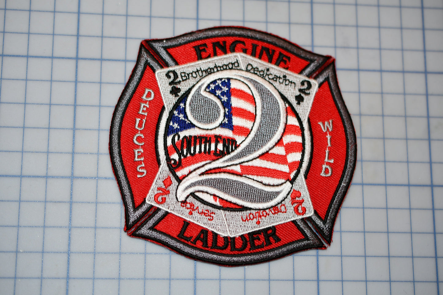a patch with the number two on it