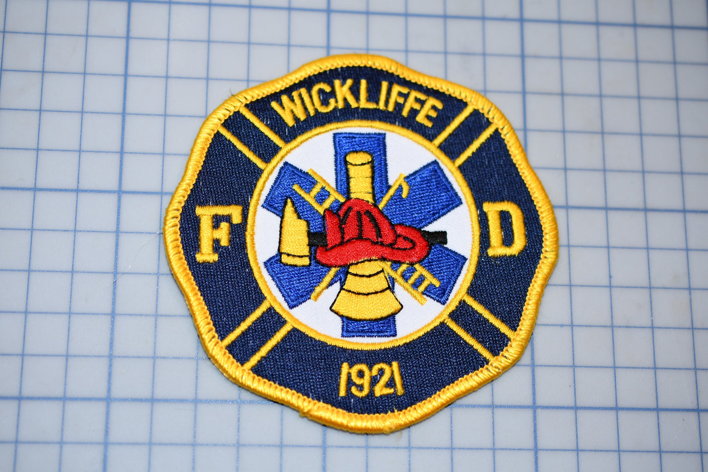 a patch with a picture of a fire department
