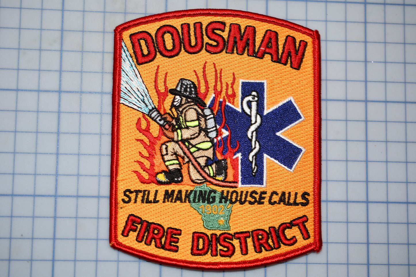 a patch with a fire department logo on it