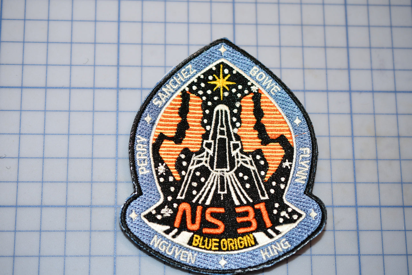 a patch with a space shuttle on it