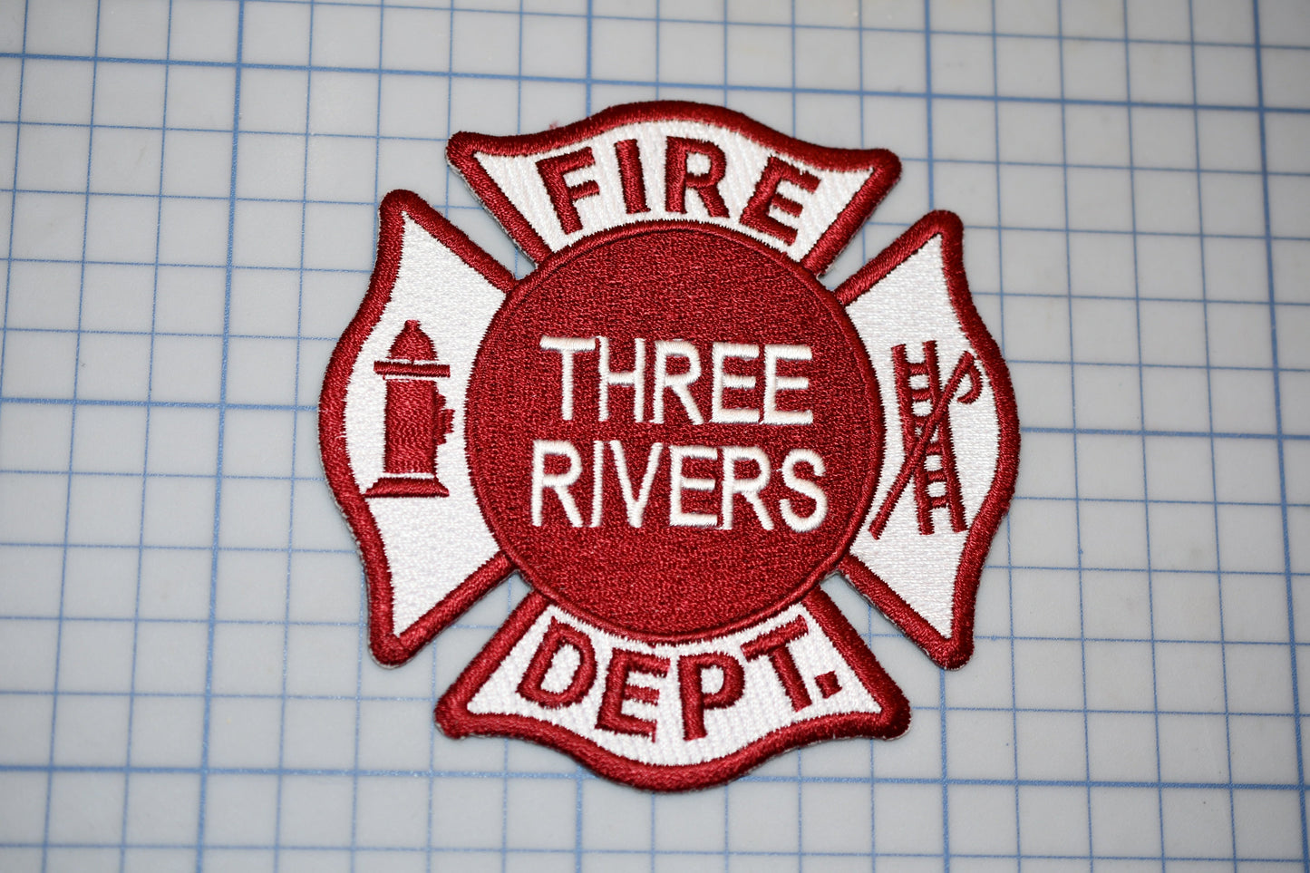 a fire department patch with the words three rivers dept