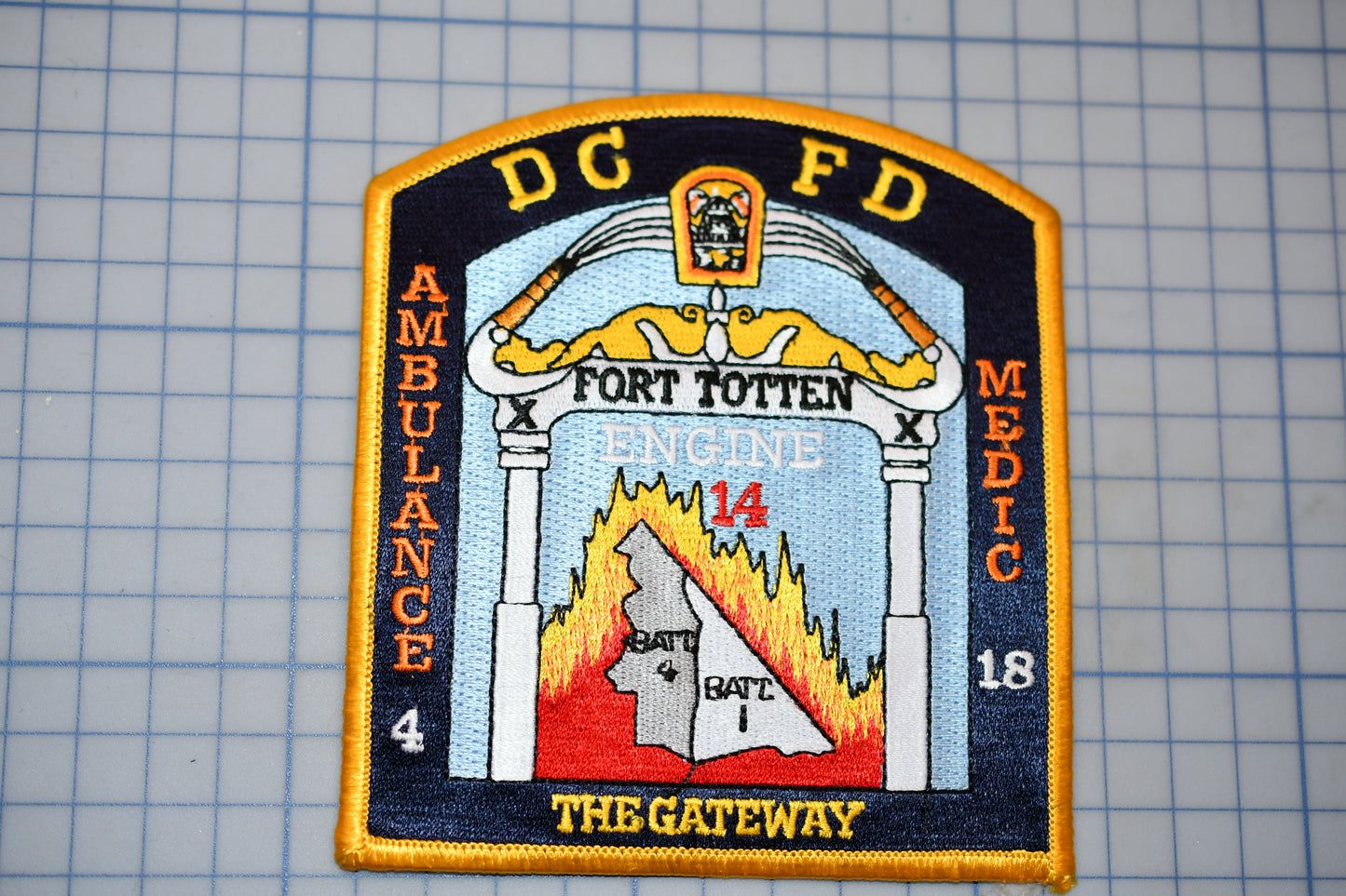 a patch with a picture of a fire station