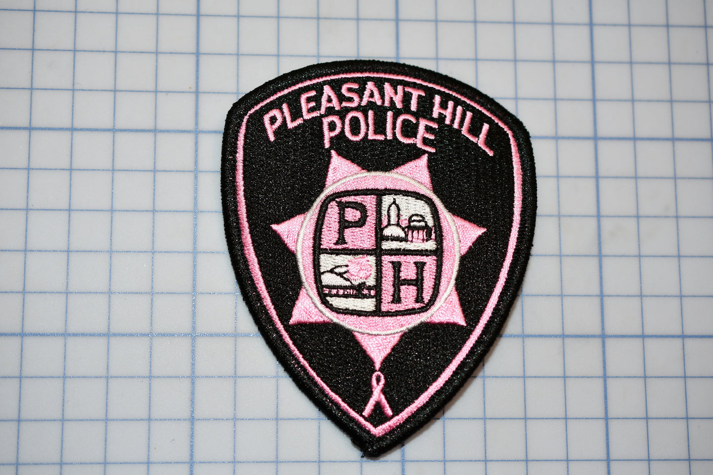 a patch with a police badge on it