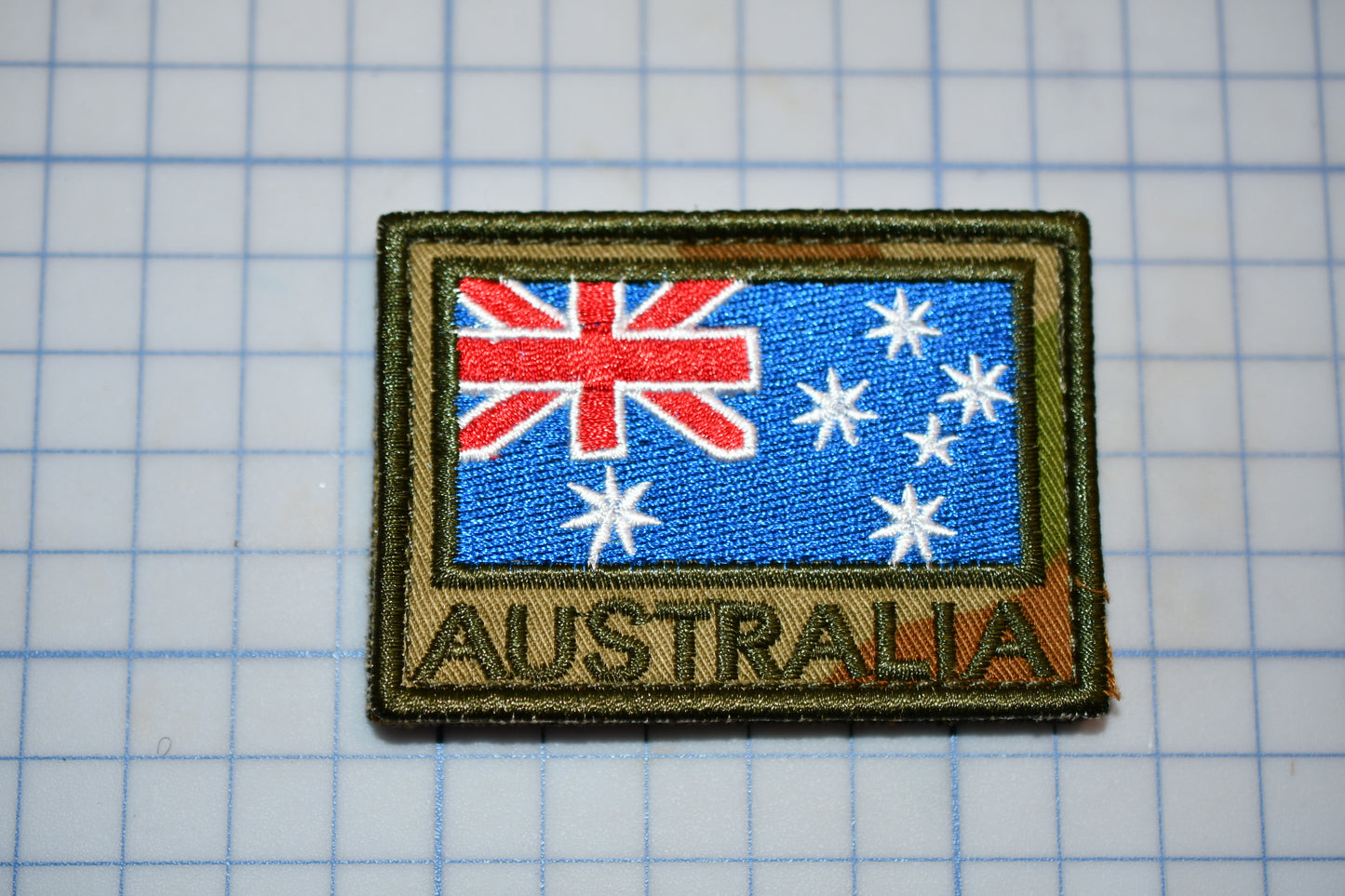 a patch with a flag of australia on it