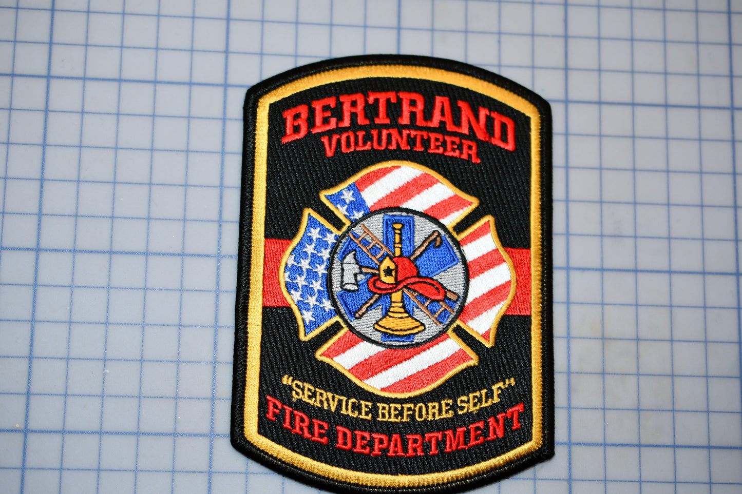 a patch with a fire department emblem on it