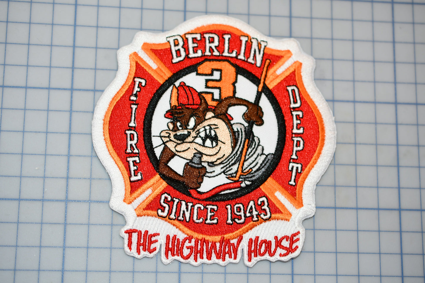 a patch with a picture of a dog on it