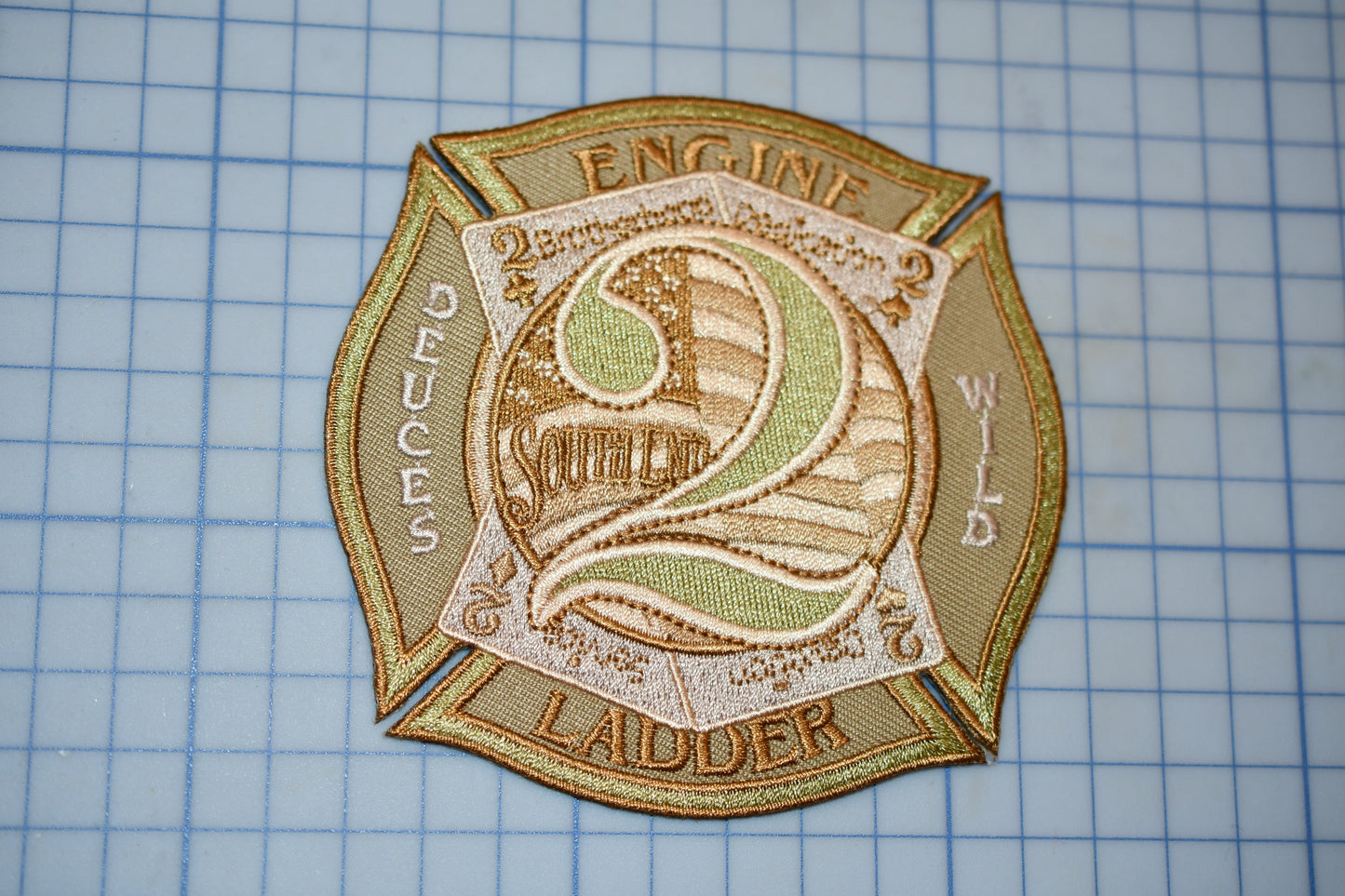 a patch with the number two on it