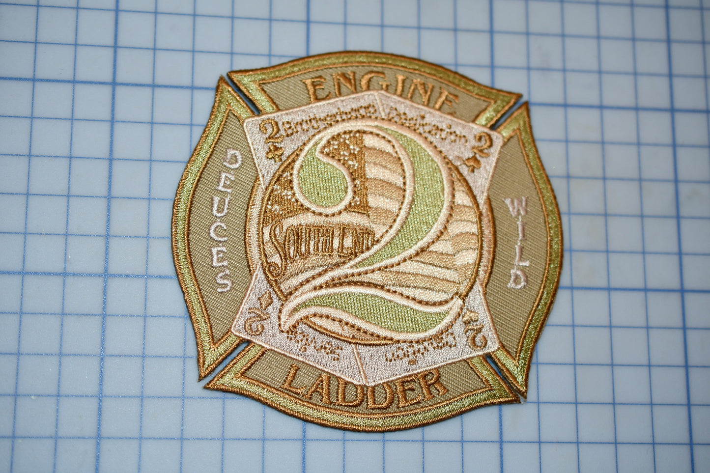 a patch with the number two on it