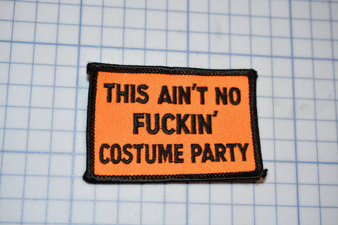 a patch that says, this isn't no fucking costume party
