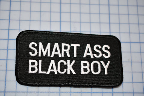 a black and white patch that says smart ass black boy