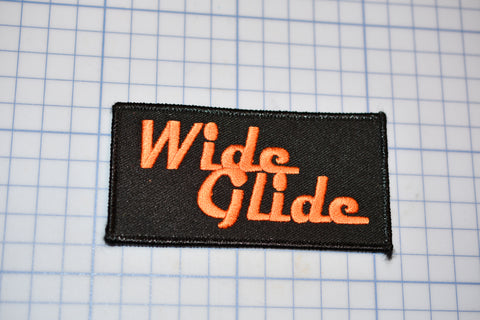 a patch with the words wide glide on it