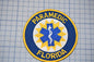 a circular patch with the text "PARAMEDIC FLORIDA" and a medical symbol, likely representing a medical emergency response team or organization.