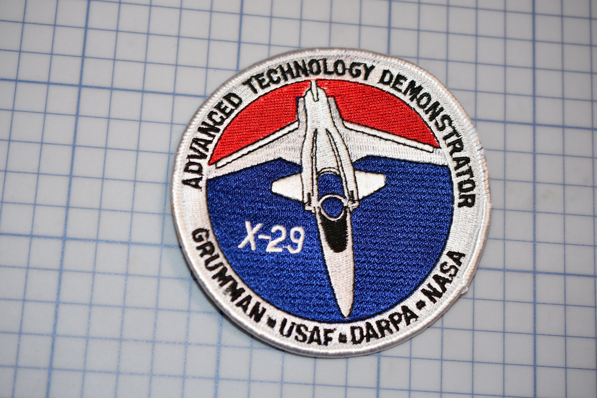 a patch with a picture of a plane on it