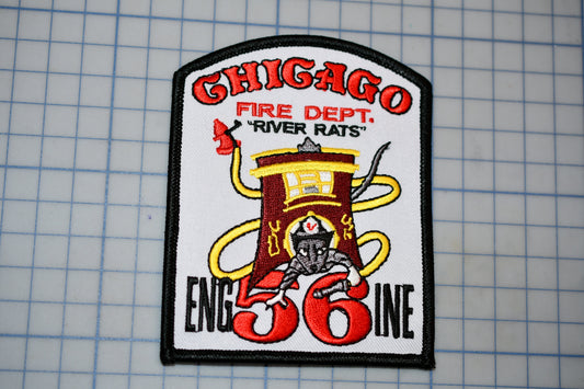 A patch with the text "CHICAGO FIRE DEPT. 'RIVER RATS'" and an illustration of a fire hydrant with a yellow hose. The patch also features the number "56" and the text "ENGIN 36".