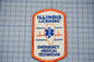 a patch with the text "ILLINOIS LICENSED EMERGENCY MEDICAL TECHNICIAN" and a medical symbol, indicating that the person is an Illinois Emergency Medical Technician.