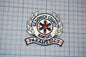 a badge or patch with the text "Sedgwick County Kansas Paramedics" and a medical symbol, likely representing a medical emergency response team.