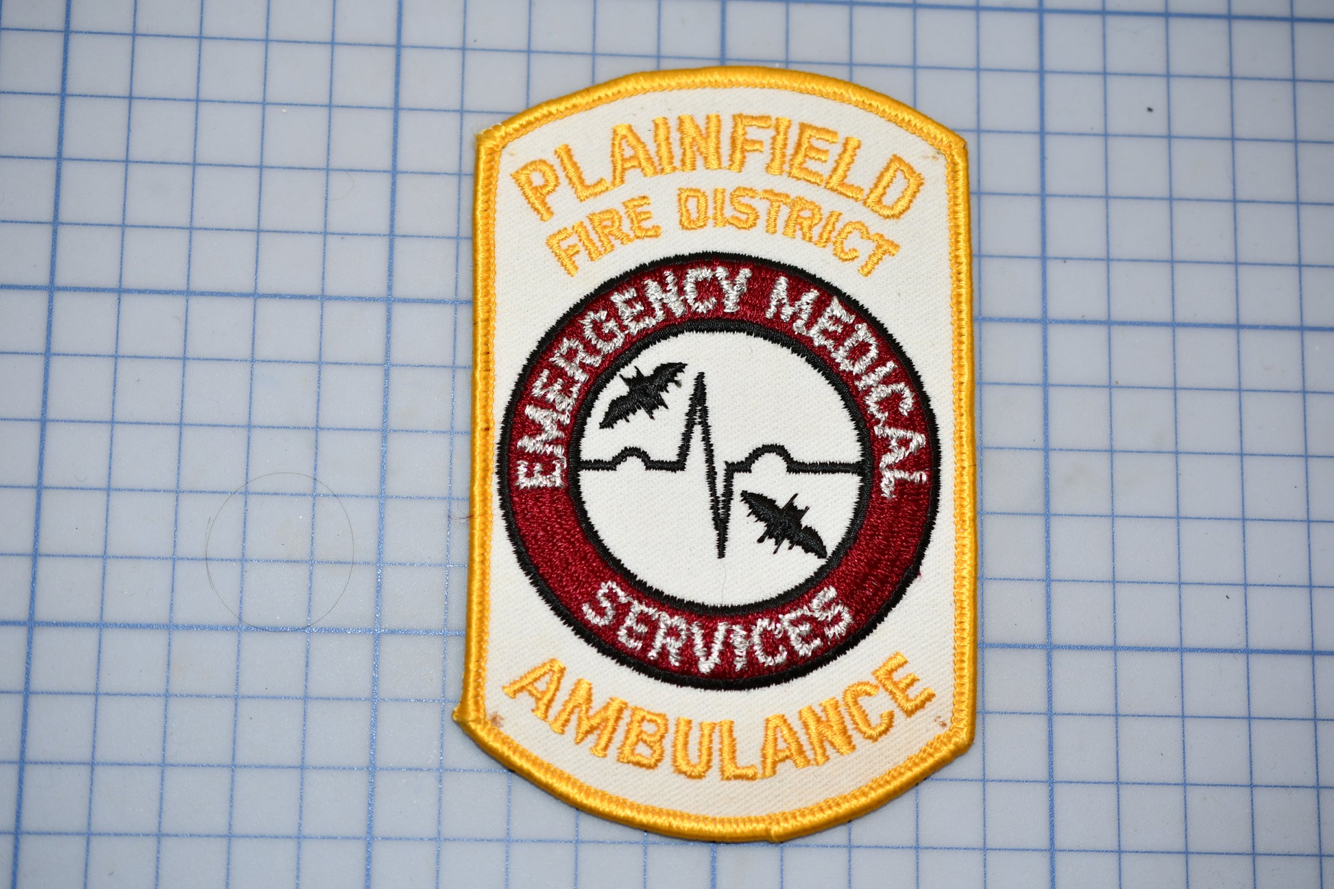 a Plainfield Fire District Emergency Medical Services Ambulance patch.