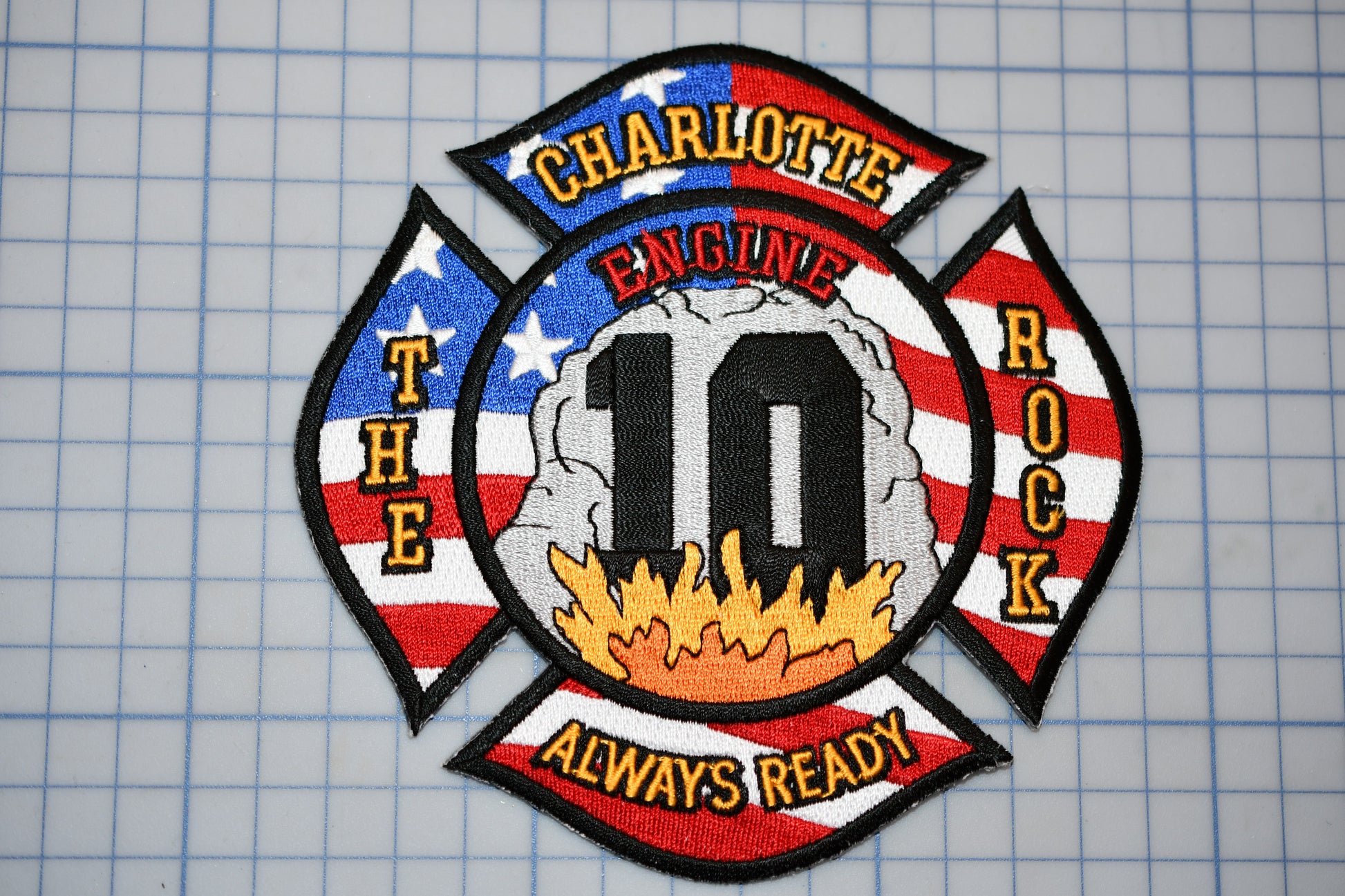 a patch with the number ten on it