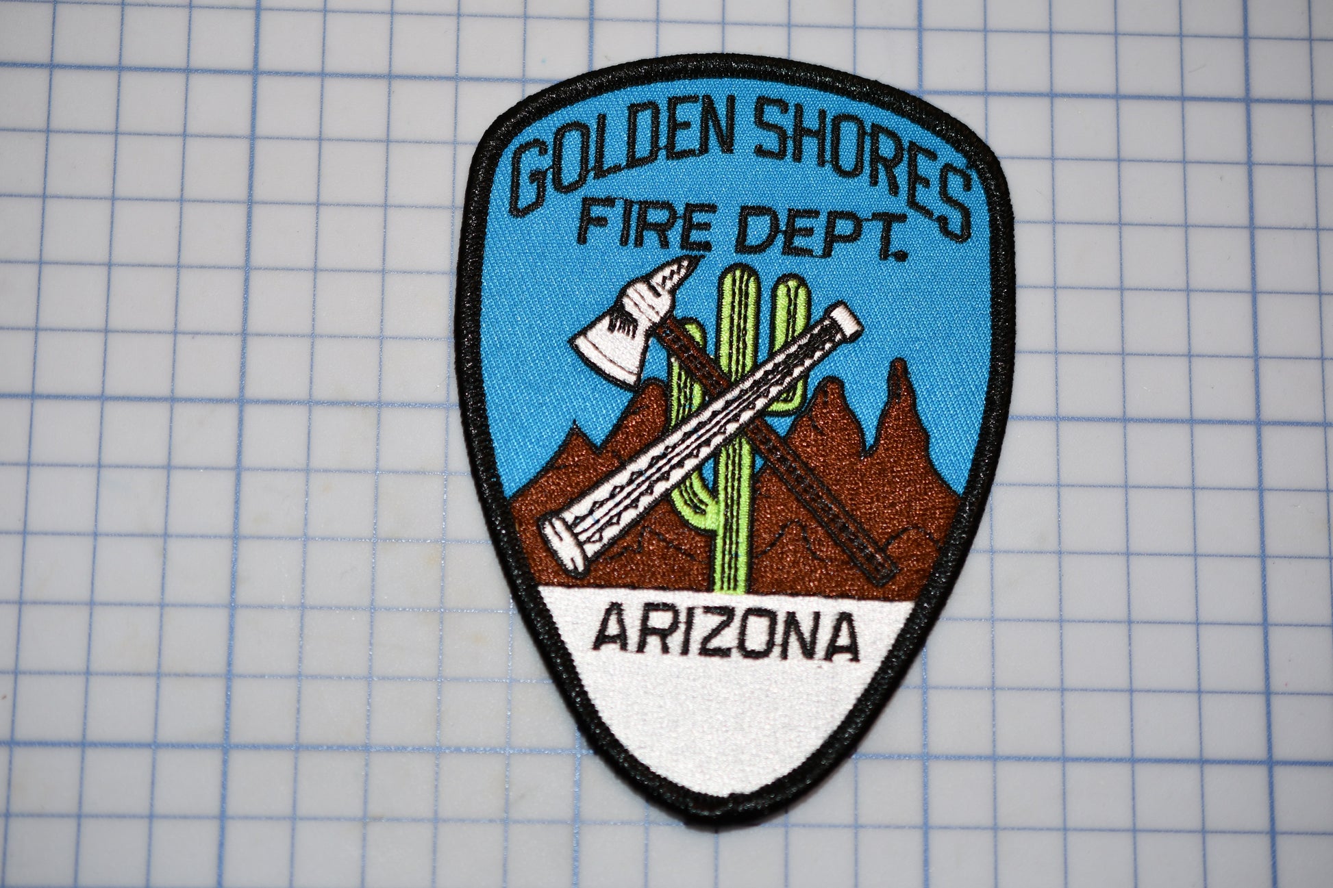 a patch with a picture of a fire department