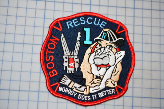 a patch with a cartoon dog and a firefighter, representing the Boston Rescue Fire Department.