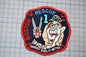 a patch with a cartoon dog and a firefighter, representing the Boston Rescue Fire Department.