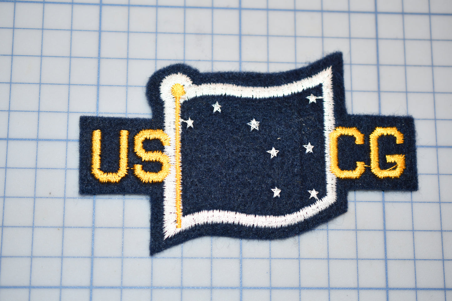a close up of a patch on a table