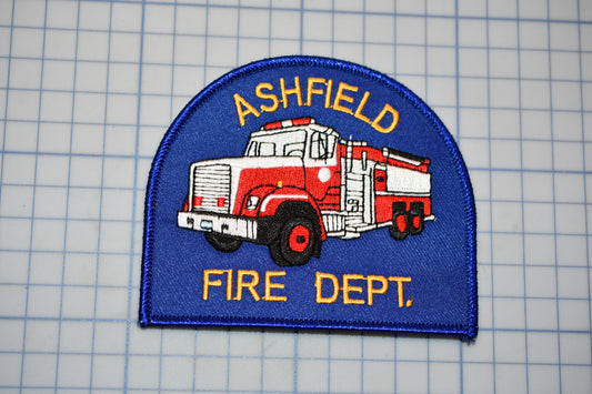 a patch with a fire truck on it