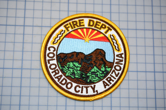 a fire department patch on a piece of paper