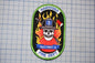 a patch with a firefighter's helmet and a skull, representing the fire department of Hartford.