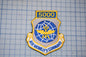 a military emblem with the number "5000" and the words "Air Mobility Command" written on it.