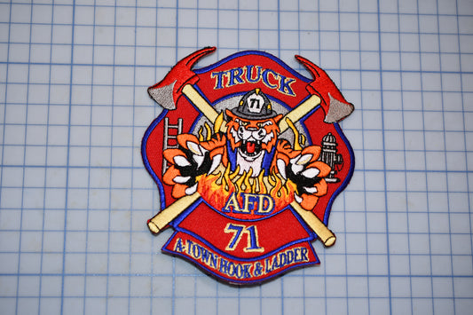 a patch with a fire department emblem on it