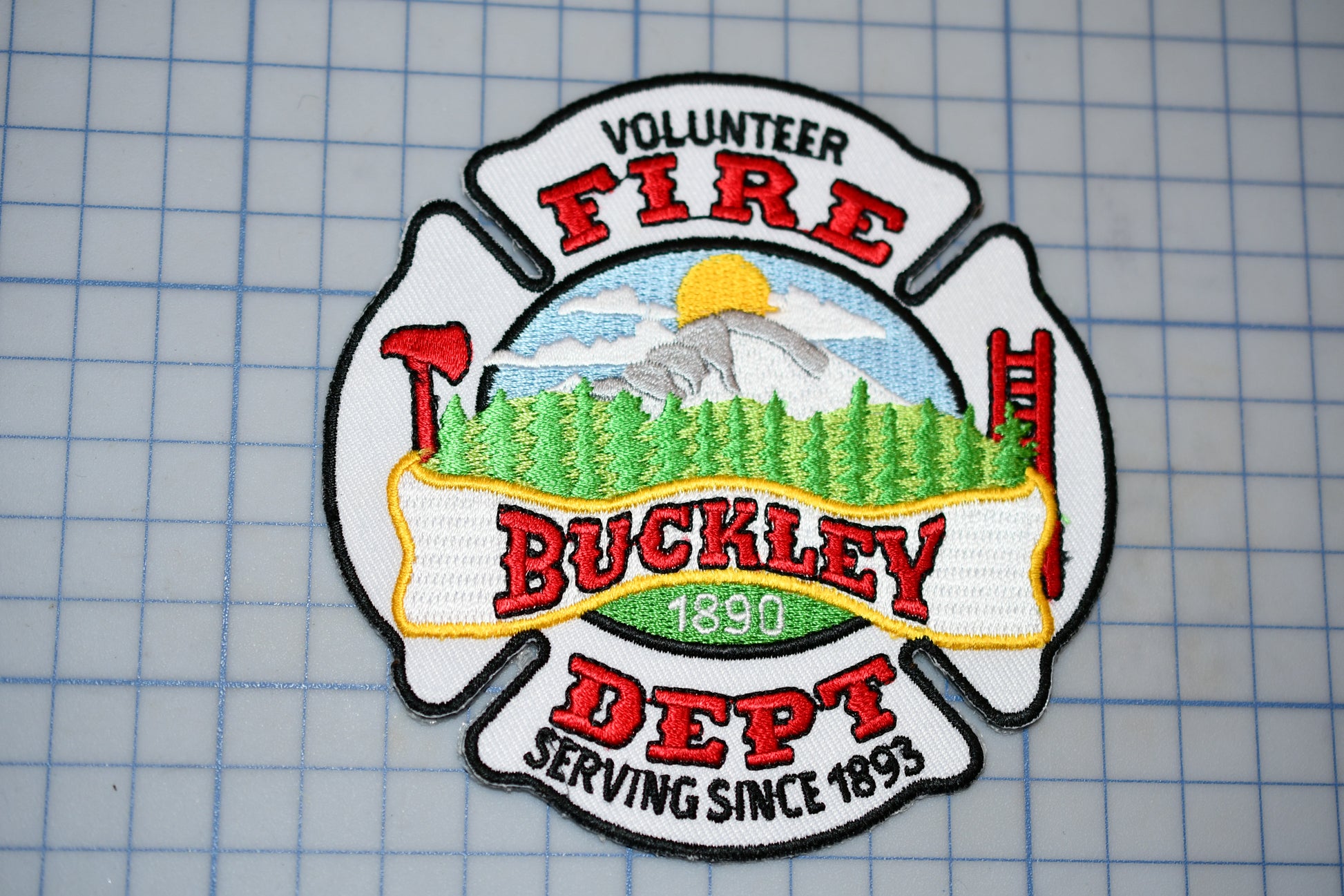 a volunteer fire department patch on a cutting board