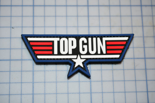 a top gun logo on a piece of paper