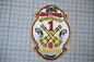 a fire department patch with the text "HARTFORD DISTRICT 1" and "TOUR COMMANDER" printed on it.
