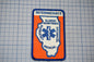 a patch with the word "INTERMEDIATE" and the word "ILLINOIS" written on it, along with the word "EMERGENCY" and "TECHNICAL" written below. The patch is set against a blue grid background.