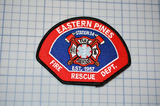 a patch that says eastern pines fire rescue dept