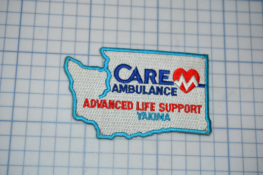 a patch with the text "Care Ambulance Advanced Life Support Yakima" on it, along with a heart symbol.