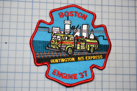A fire department patch with a fire truck and the words "Boston" and "Engine 37" printed on it.